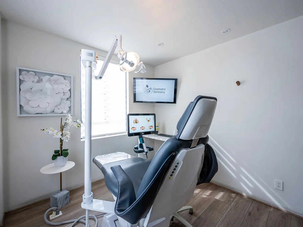 Exam room with natural light and fresh orchids