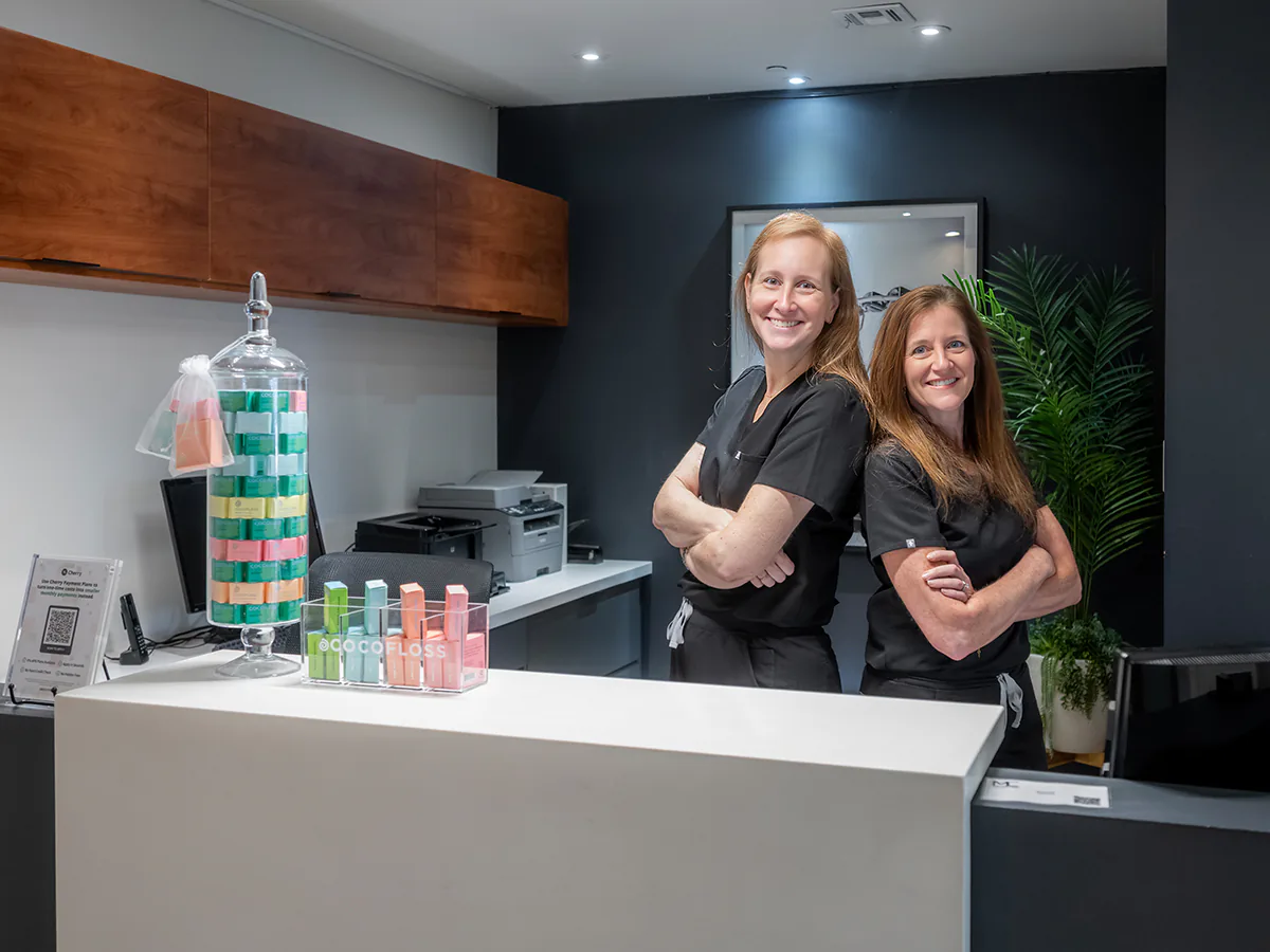 Front desk team welcoming a patient at Beverly Hills Cosmetic Dentistry