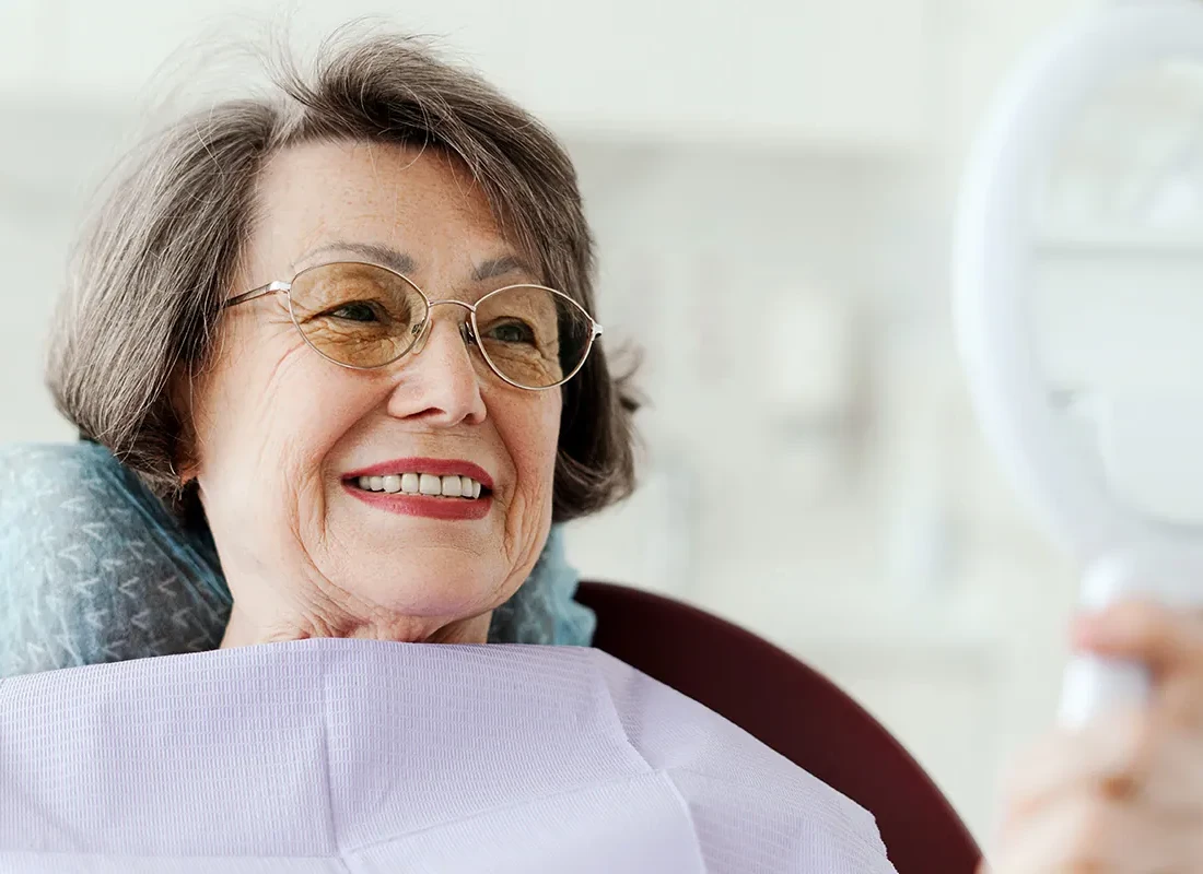 Signs you may need implant-supported denture restoration — Beverly Hills Cosmetic Dentistry